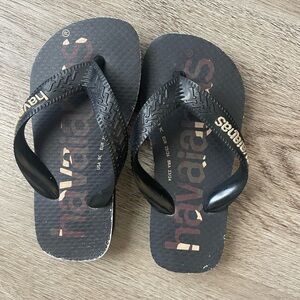 Havaianas Black and Gold Flip Flops